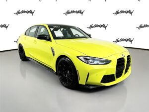 BMW M3 Competition xDrive sedan in metallic gray with aggressive styling